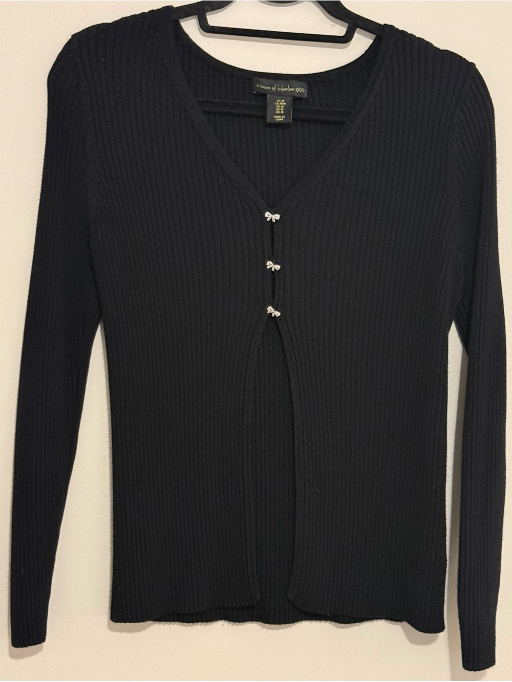 House of Harlow 1960 Black Ribbed V-Neck Sweater with Bow Accents